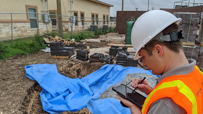 Inspectors developing a strategy to minimize fines and manage a code violation notice issue.